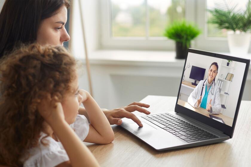 Patient video consulting with DocSearch physician from home